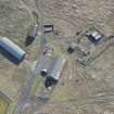 Oblique aerial view of Barry Buddon Military Training Area Firing Range and Nissen Hut, looking S.