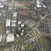 Oblique aerial view of Lochee, looking ESE.