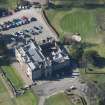 Oblique aerial view of Ratho Park Country House, looking to the W.