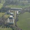 Oblique aerial view of Duddingston House Hotel, looking to the S.