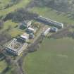 Oblique aerial view of Duddingston House Hotel, looking to the SE.