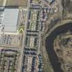 Oblique aerial view of of the Glasgow Commonwealth Games site including the athlete's village, looking to the NE.