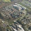 Oblique aerial view of of Stobhill General Hospital, looking to the ESE.