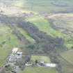Oblique aerial view of Kilbirnie Place Golf Course, Kilbirnie House and Place farm, looking SSE.