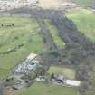 Oblique aerial view of Kilbirnie Place Golf Course, Kilbirnie House and Place farm, looking SSE.