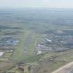 Oblique aerial view of Prestwick Golf Course and Prestwick Airport, looking SE.