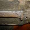 Original metal strapping on rear of door which leads to the attic space