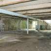 Interior. Ground floor level area adjacent to Dispatch and Office area. Possibly storage area for boxed margarine. General view from east. Access to first floor in background.