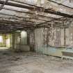 Interior. First floor. General view from north of dairy, 1911 rebuild central block with tower extension, with its concrete floor for ease of cleaning