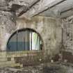 Interior. First Floor. Detail of former external arched window.