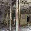 Interior. Basement level, former one storey east wing of 1911 build, former refrigeration plant room from south west, detail of columns.