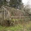 Glasshouse. View from South East. Potting shed beyond.