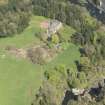 Oblique aerial view of Corra Castle and Corehouse Country House, looking NNE.