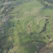 Oblique aerial view of Langholm Golf Course, looking NW.