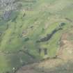 Oblique aerial view of Langholm Golf Course, looking NNW.