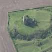 Oblique aerial view of Torthorwald Castle, looking W.