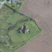 Oblique aerial view of Torthorwald Castle, looking ESE.