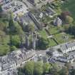 Oblique aerial view of Kelso Abbey and War Memorial, looking E.