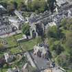 Oblique aerial view of Kelso Abbey and War Memorial, looking W.