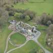 Oblique aerial view of Penicuik House, looking S.