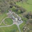 Oblique aerial view of Penicuik House, looking SSE.