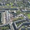 Oblique aerial view of the construction of the new James Gillespie's High School, looking S.