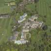 Oblique aerial view of Colinton Castle and Merchiston Castle School, looking NNE.