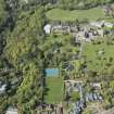 Oblique aerial view of Colinton Castle and Merchiston Castle School, looking NNW.