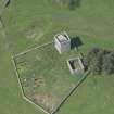 Oblique aerial view of Repentance Tower and Trail Trow Chapel, looking W.