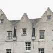 Detail of crowstepped gables on front elevation of 5 and 11-15 Canongate, Edinburgh.