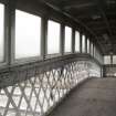 Interior, view along walkway of footbridge from East.