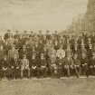Group photograph of St Andrews Golf Club members outside the Royal and Ancient Golf Club.
