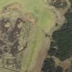 Oblique aerial view of the remains of a farmstead at Big Burn near Balvonie of Leys, looking NE.