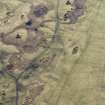 Oblique aerial view of hut circles, small cairns, field system and rig and furrow at Achvraid and Carn Glas cairns, looking S.