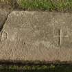View of recumbent slab with one incised cross and one incised and encircled cross