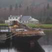 Fort Augustus upper basin and Old Timber Landing Stage with hull of Scot 11 in foreground looking NW