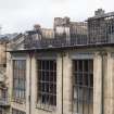 View of the fire damage windows of the first and second floor studios on the north elevation of the Mackintosh building, taken from the north west on the roof of the Bourdon building.