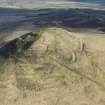 Oblique aerial view of East Lomond Hill fort, looking ENE.
