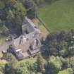 Oblique aerial view of Calder House, looking E.