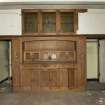 Detail of storage unit glass fronted cupboards in dining room, ground floor.