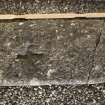 Recumbent slab with 3 incised crosses (including scale)