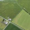 Oblique aerial view of the cropmarks of the Saint Fergus and North Ugie Canal, looking SSE.
