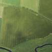 Oblique aerial view of the cropmarks of the Saint Fergus and North Ugie Canal, looking NNW.