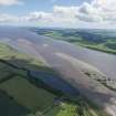 General oblique aerial view of the River Tay reed beds with Port Allen in the foreground and Fife beyond, looking ESE.