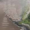 Oblique aerial view of the fish trap, looking E.