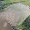 Oblique aerial view of the fish trap, looking E.