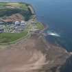 Oblique aerial view of Hunterston Nuclear Power Station, looking S.