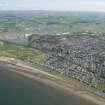 General oblique aerial view of Prestwick and Prestwick Airport, looking ENE.
