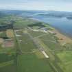 Oblique aerial view of Inverness Airport with Inverness in the distance, looking WSW.