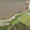 Oblique aerial view of the fish trap and the Fort George sports ground, looking SW.